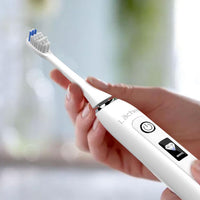 Electro-Sonic Toothbrush with 5 Cleaning Functions, LCD Display, and 4 Replacement Heads